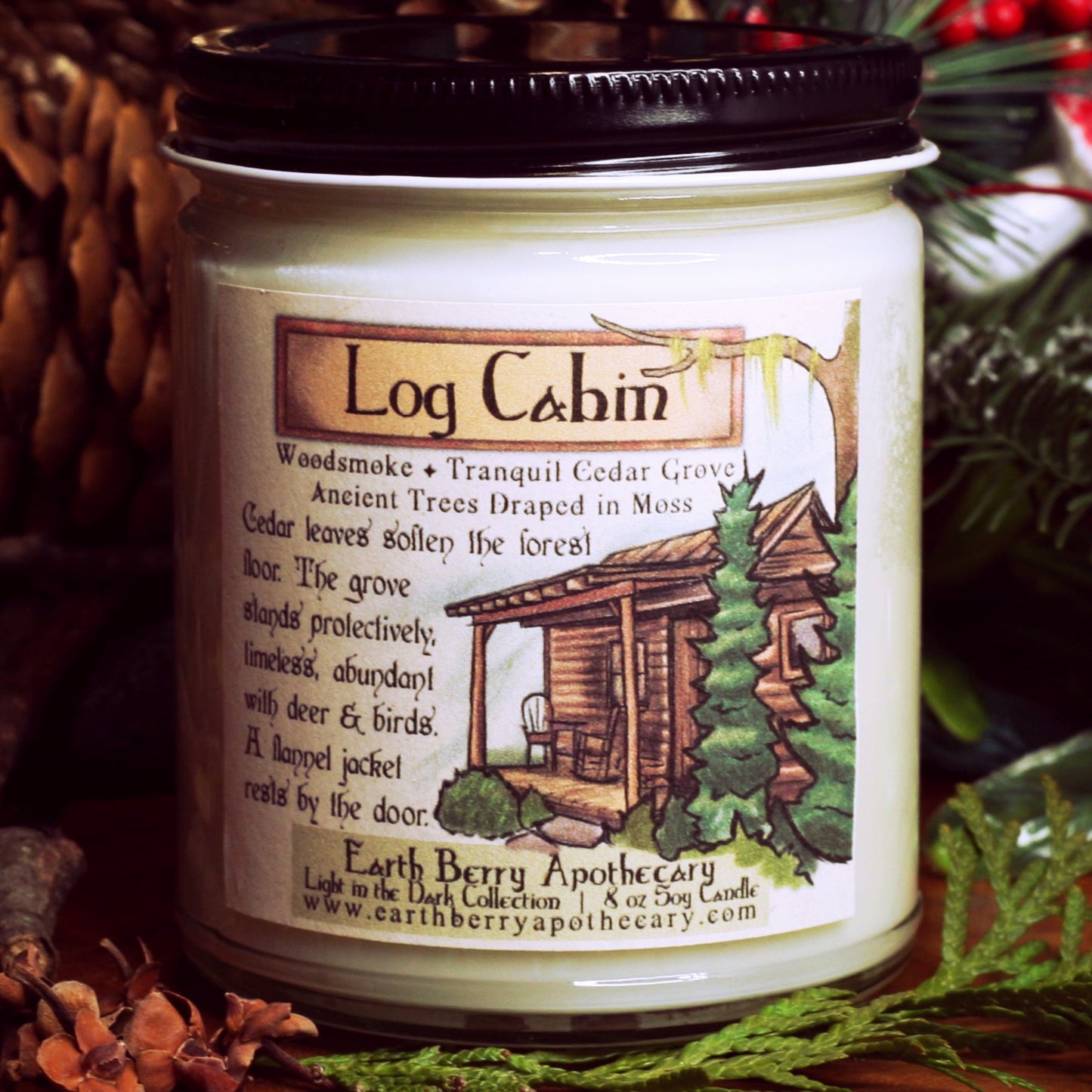 Log Cabin cedar, woodsmoke, and moss scented soy candle. Always clean burning, and nontoxic.