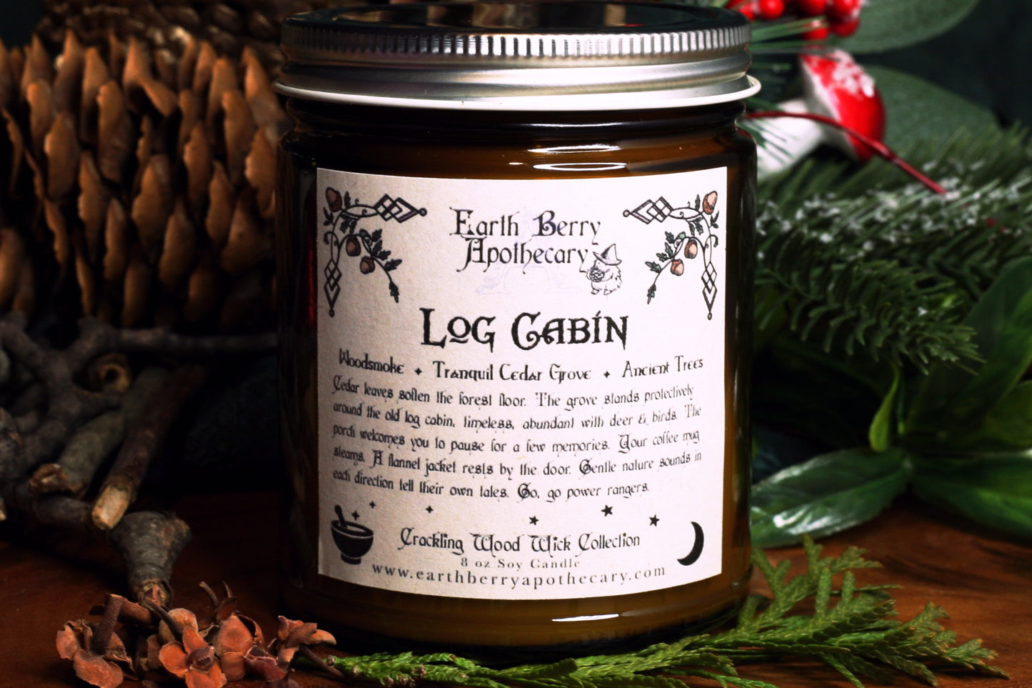 An elegant, woodsy crackling wood wick soy candle called log cabin