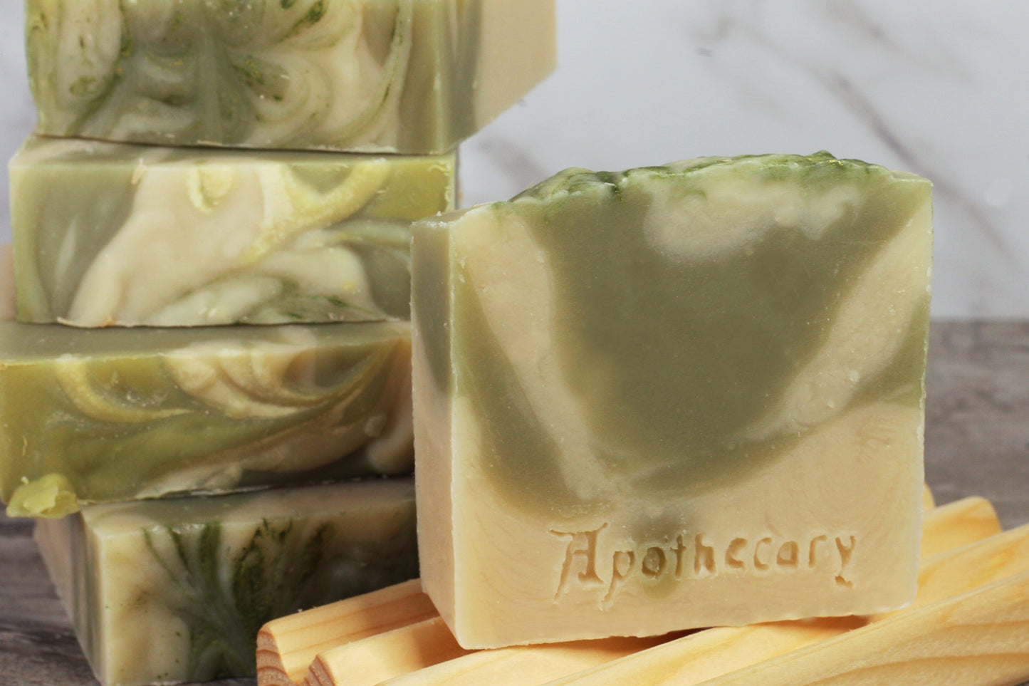 Green and white swirled handmade soap with orchard pear scent