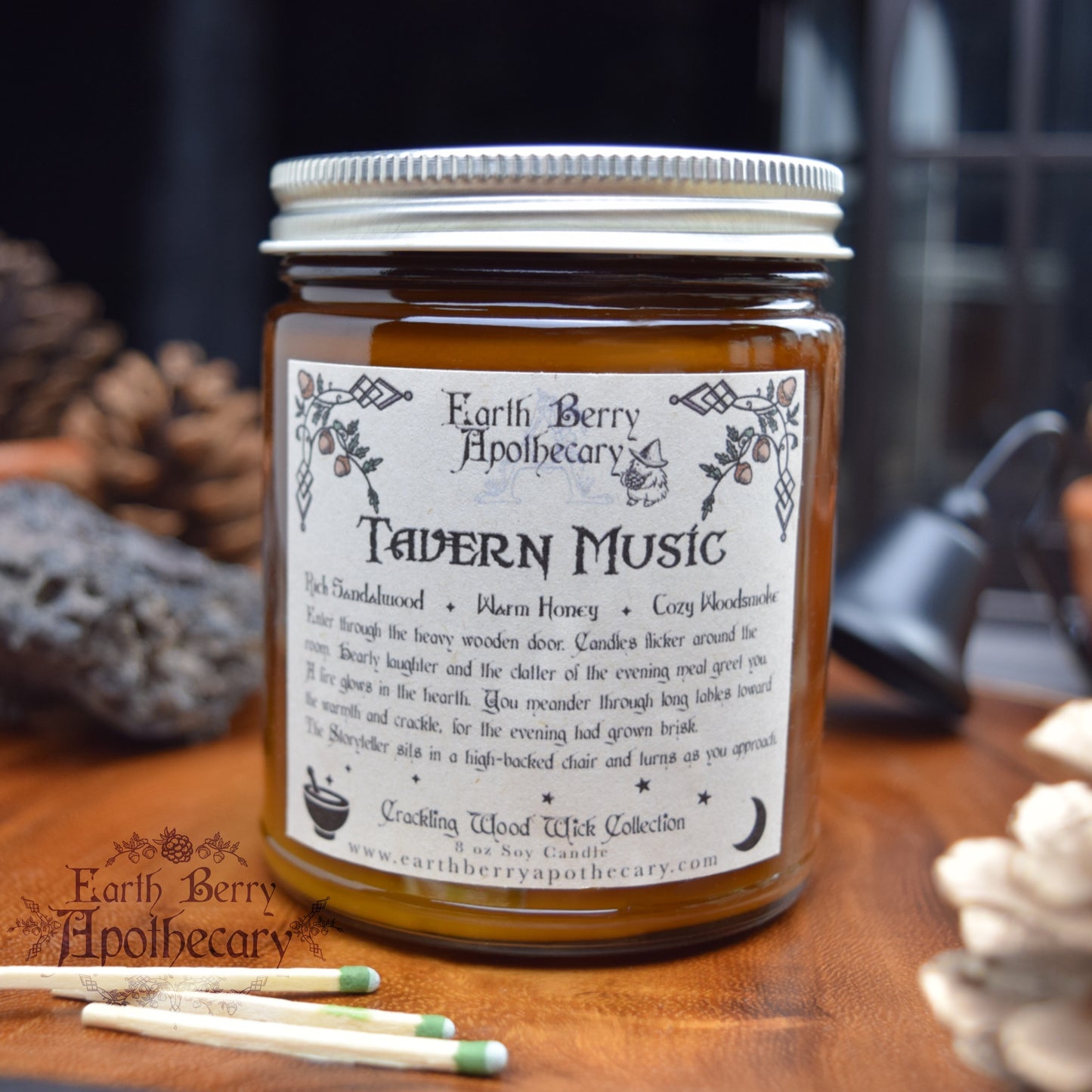 Fantasy tavern candle in an amber jar with a crackling wood wick