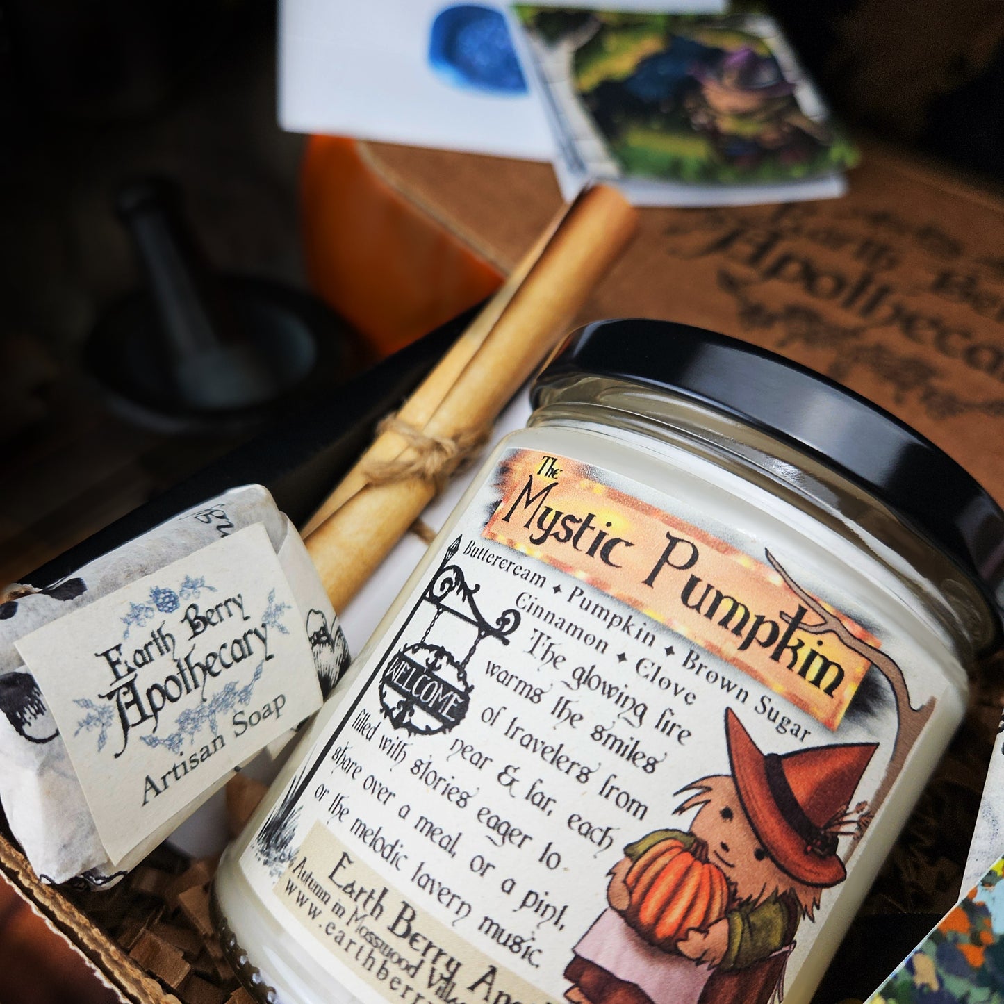 Best pumpkin spice candle fantasy set with soap and art on a rustic background
