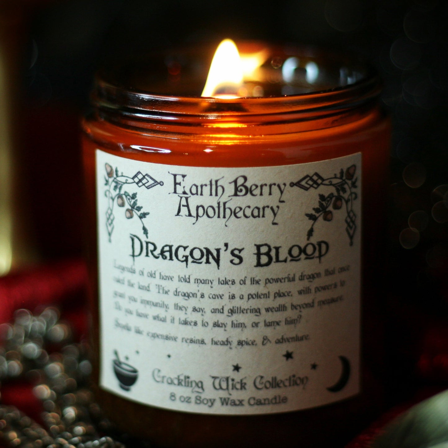 Dragons blood scented crackling wood wick candle.