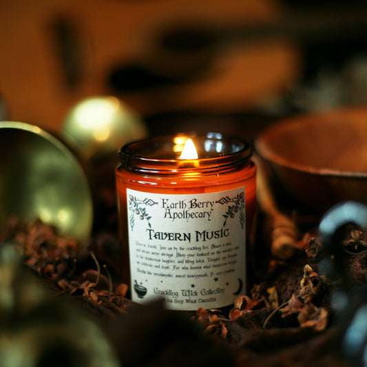 Fantasy tavern themed candle in an amber jar called tavern music.