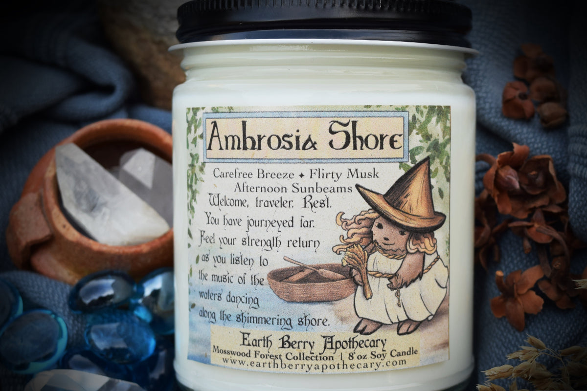 Greek and Roman inspired mythology themed soy candle. A hedgehog goddess stands on a sunny mystical beach. Light, breezy scent. Sexy beach candle.