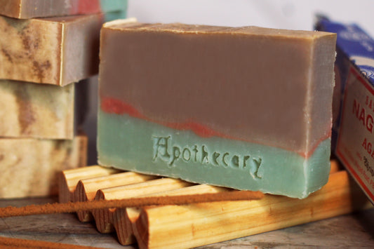 Nag Champa scented handmade soap layered beige, red, and blue