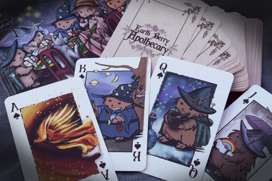 Fantasy deck of playing cards featuring forest creatures, hedgehogs, mushrooms, cats, and forest magic.