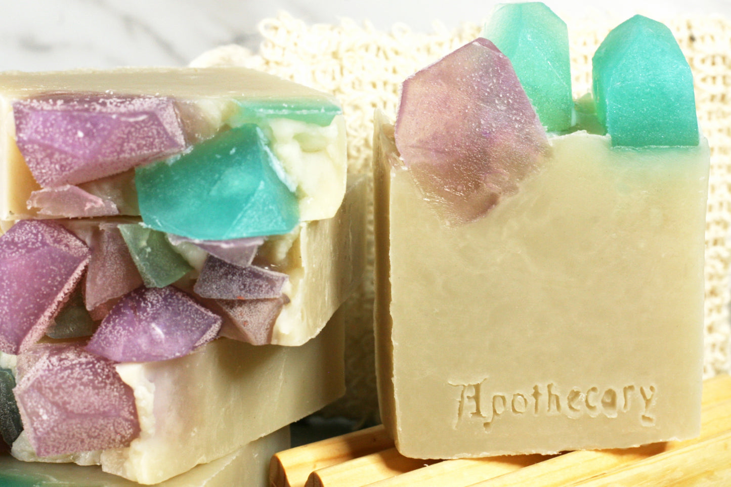 Crystal cavern soap is silvery grey with shining crystals hand cut from soap on top