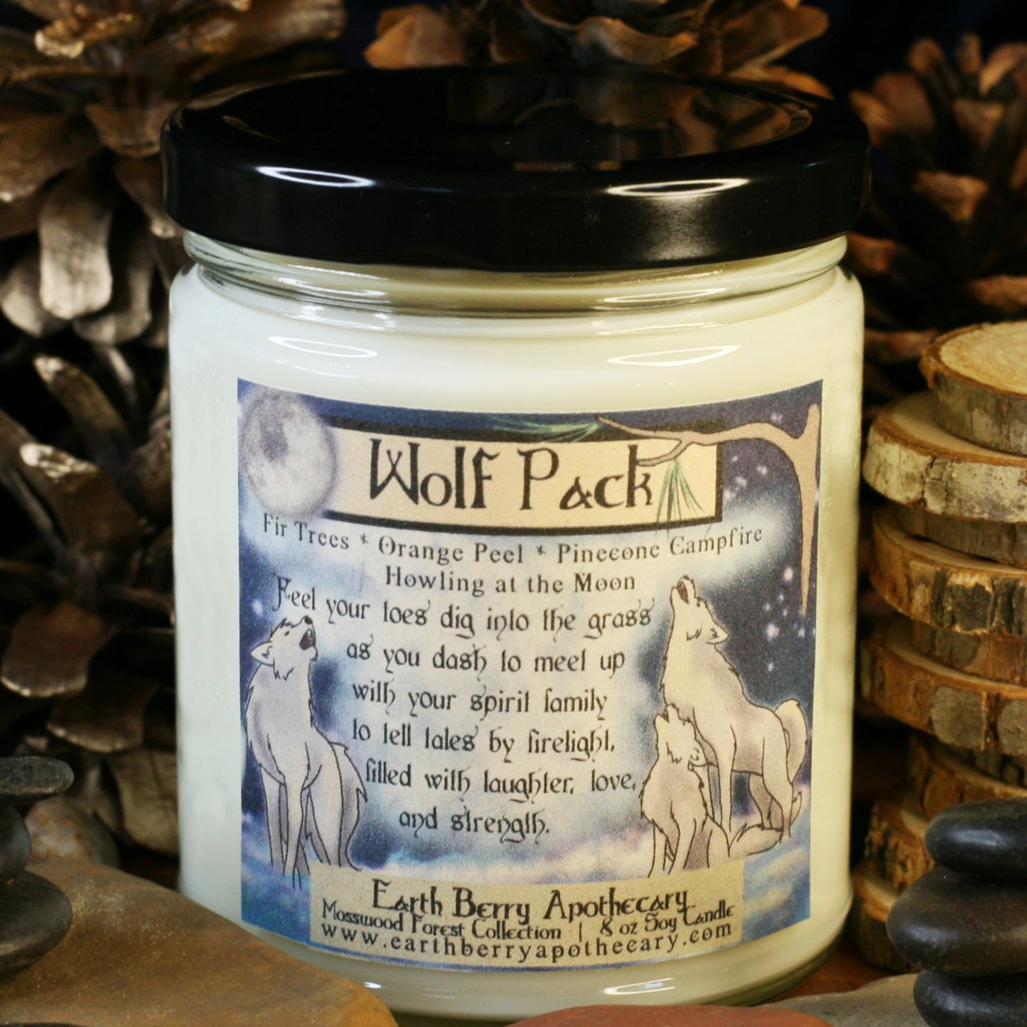 Orange citrus, pine, and campfire scented candle called wolf pack