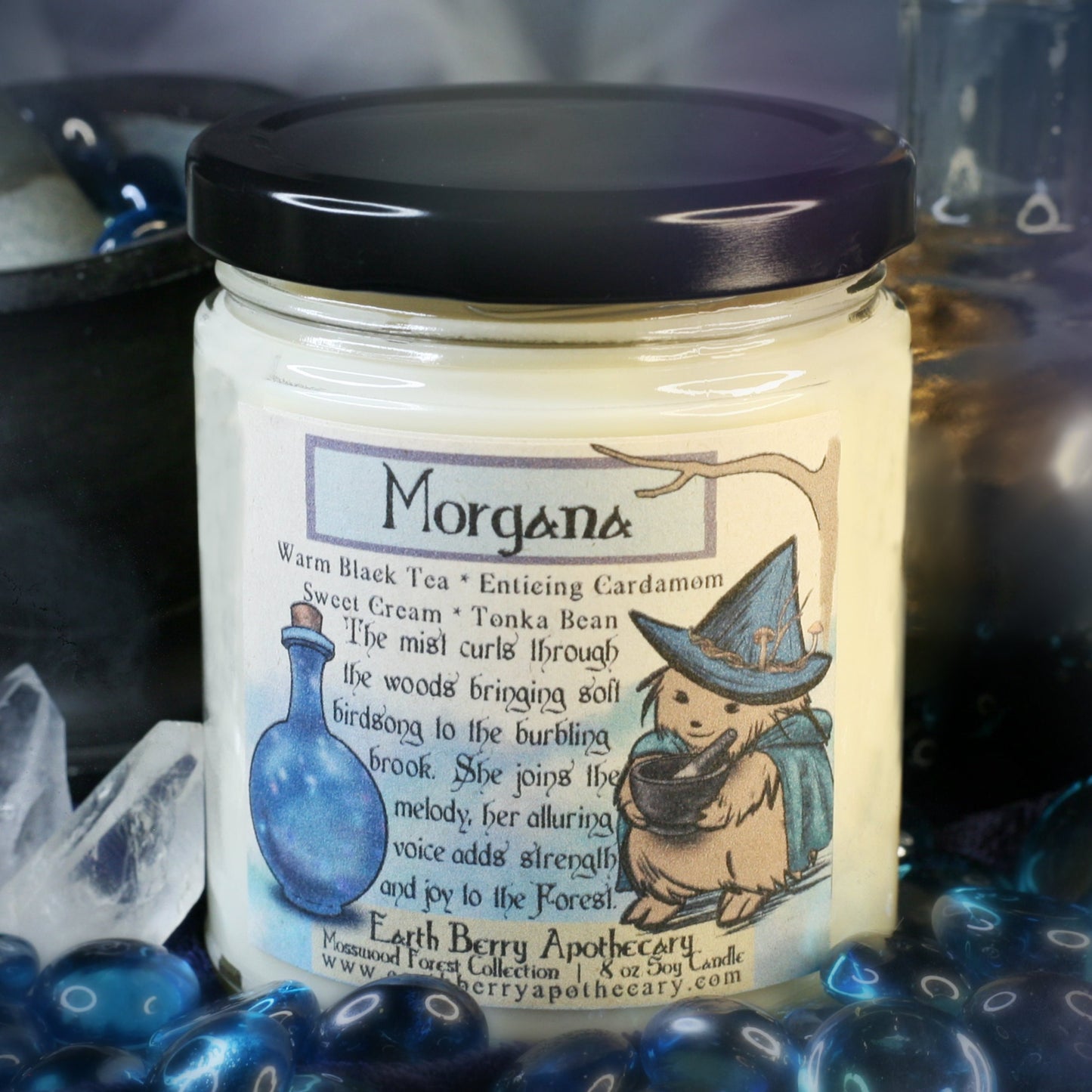 Black tea and cream with cardamom spice scented fantasy themed candle called Morgana